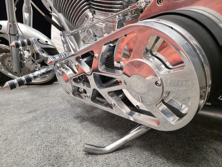 Polished BDL primary drive and rider foot controls on custom chopper