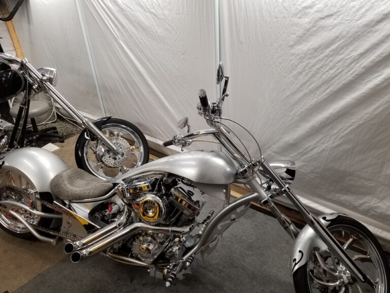 Full view of silver Big Bear Choppers Sled 300 Pro Street with chrome V-twin engine