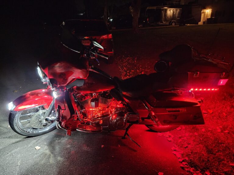 2008 Ultra Classic Custom motorcycle at night with red accent lighting